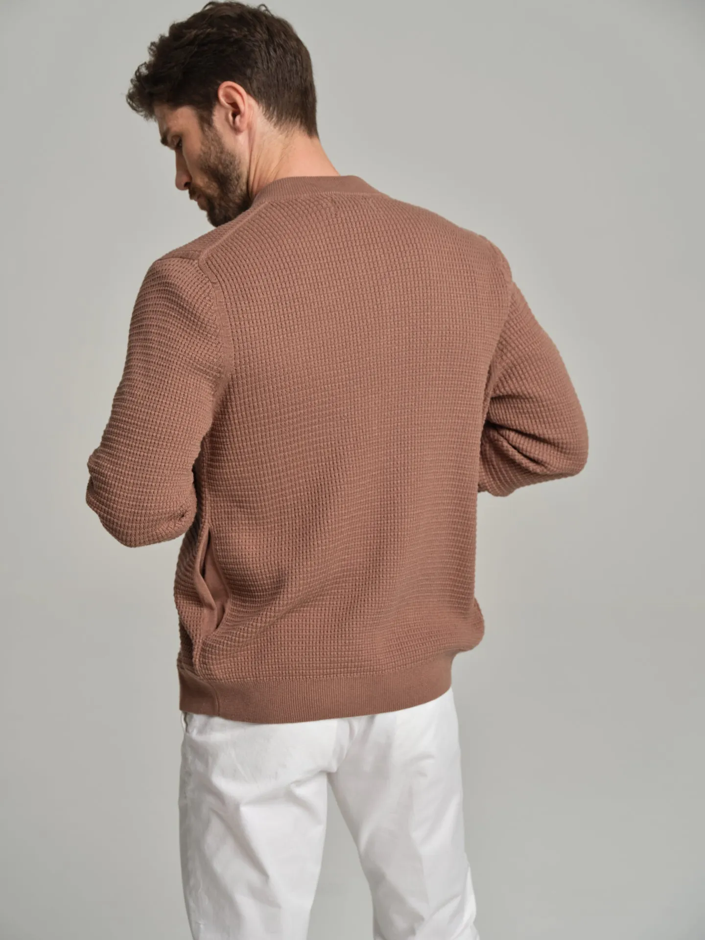 Knitted bomber with waffle knitting